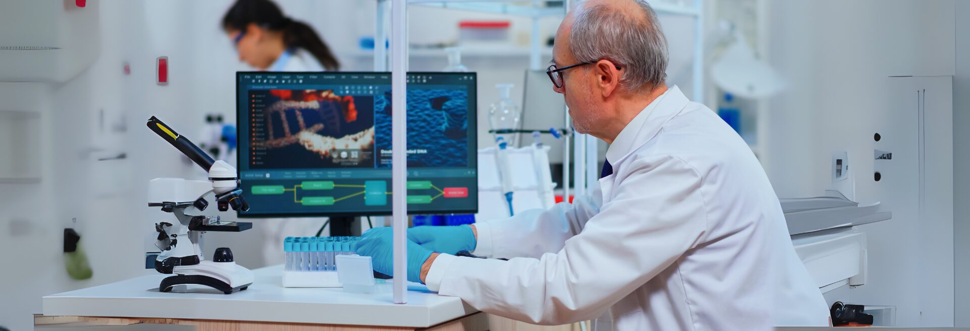 Scientist examining drug discovery using artificial intelligence and tubes