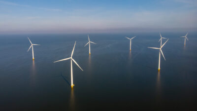 offshore-windmill-park-with-clouds-and-a-blue-sky