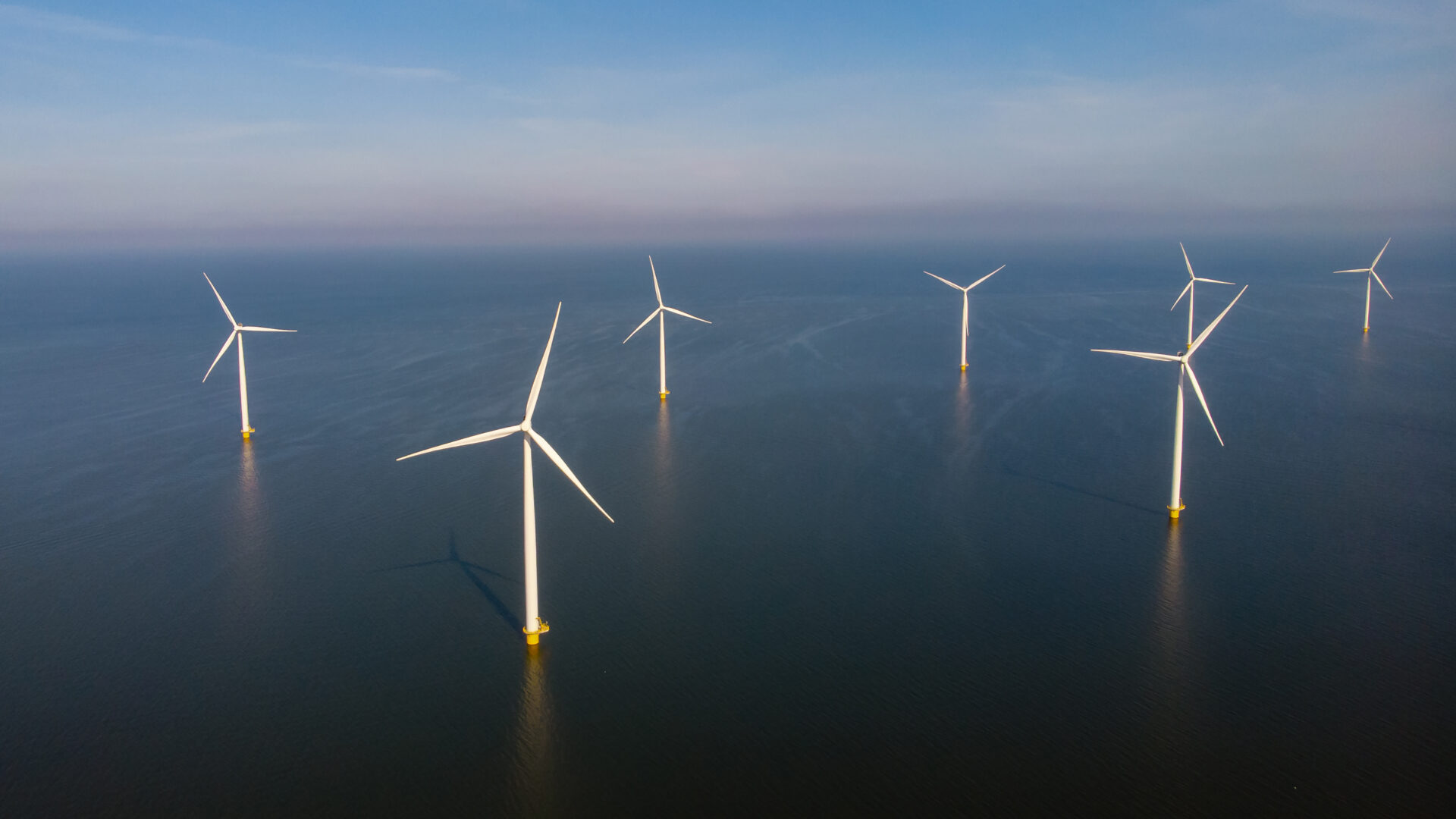 offshore-windmill-park-with-clouds-and-a-blue-sky