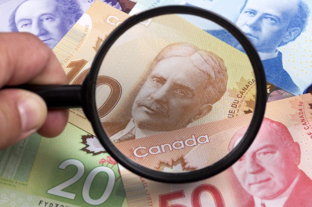 Canadian dollar banknotes representing tax credits, funding opportunities, and financial growth for Canadian businesses