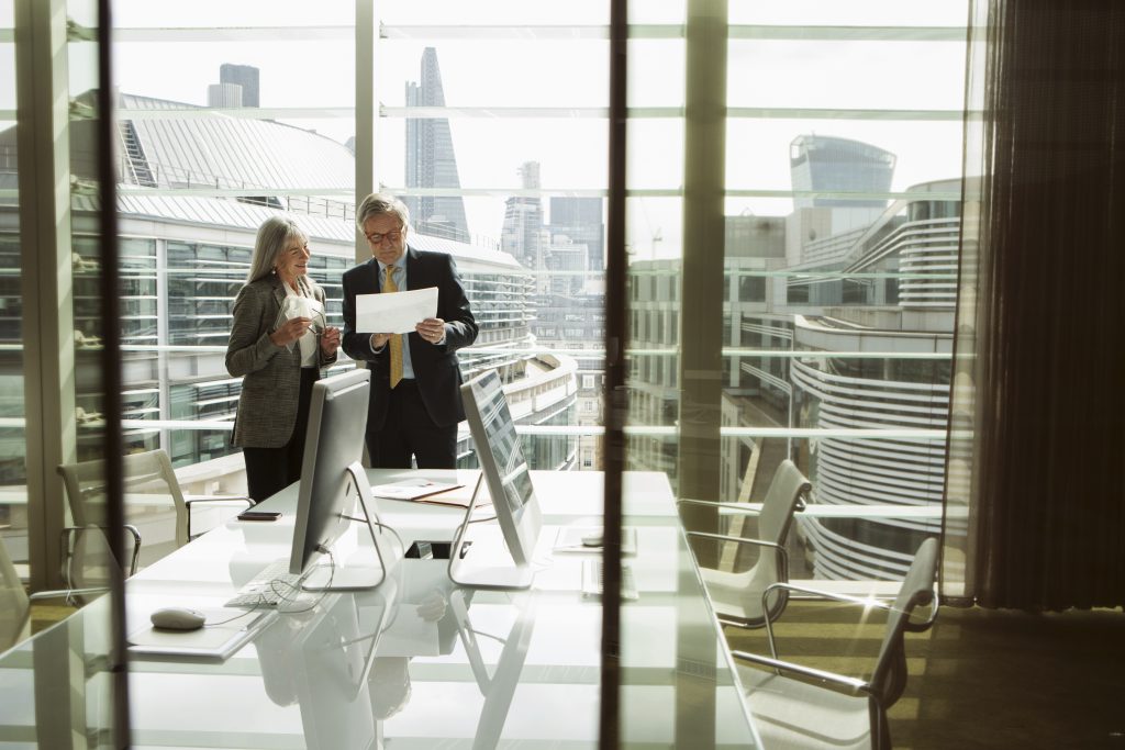 two-professionals-discussing-a-document